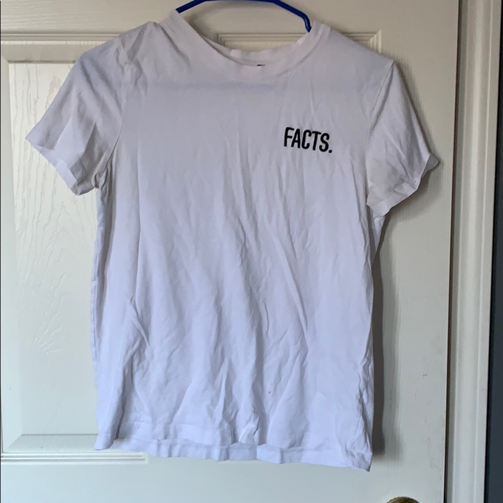 White top that reads FACTS.